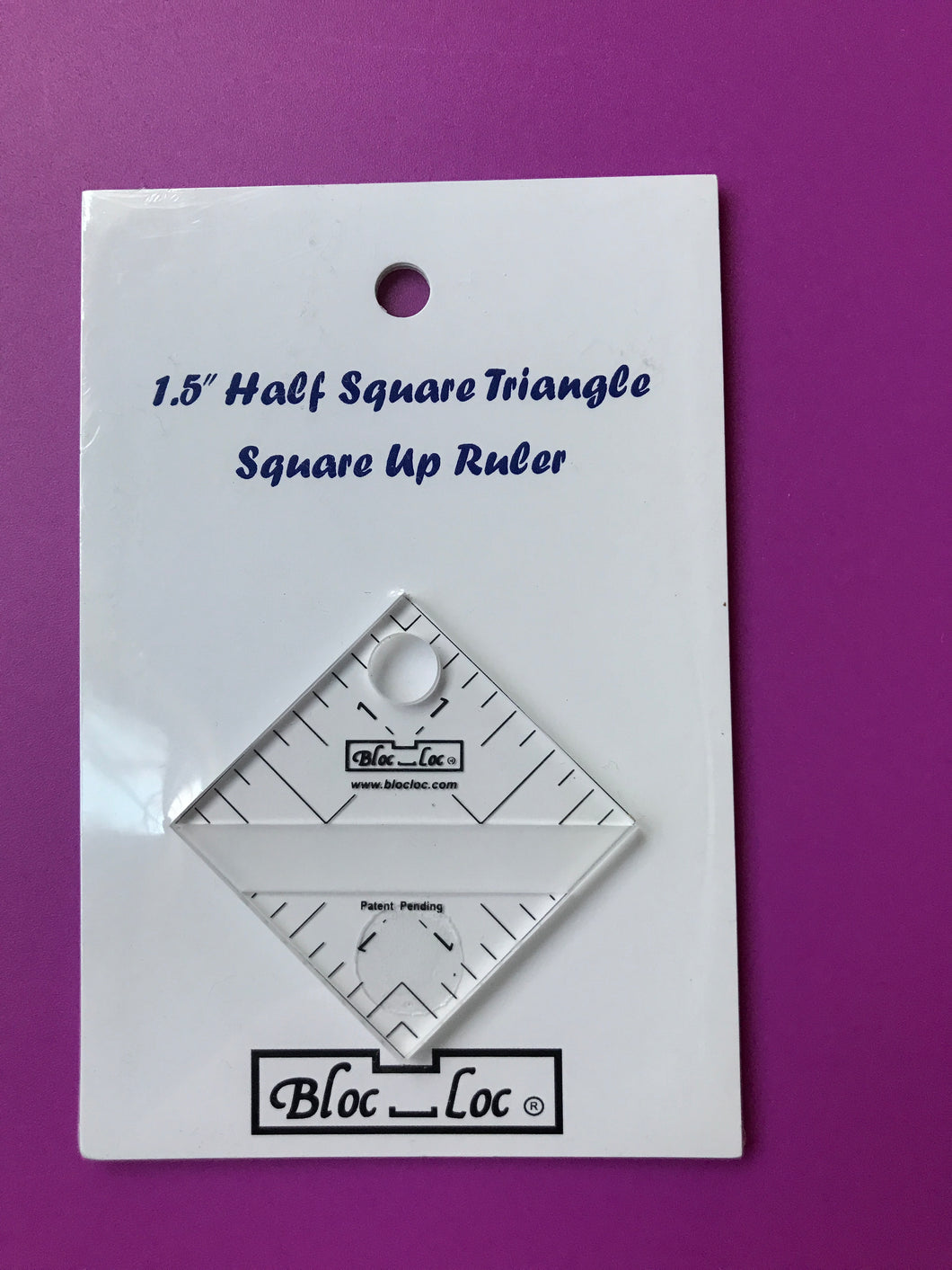 Learn to make perfect Half Square Triangles with this ruler